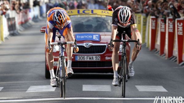 Luis Leon Sanchez and Jens Voigt throw their bikes